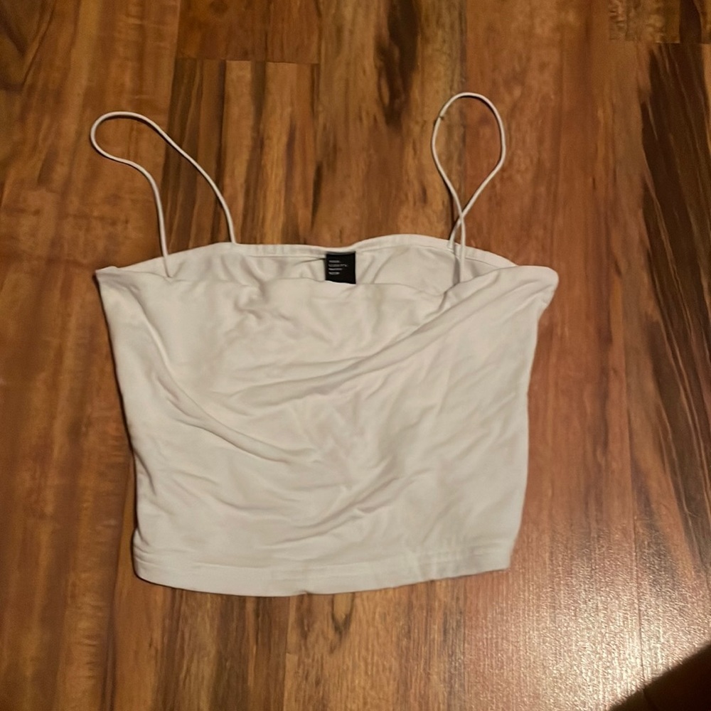 A white tank top/crop top, women’s XS, from Cider.